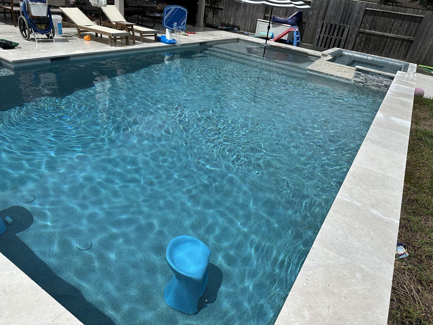 Modern rectangular customer pool with clear water